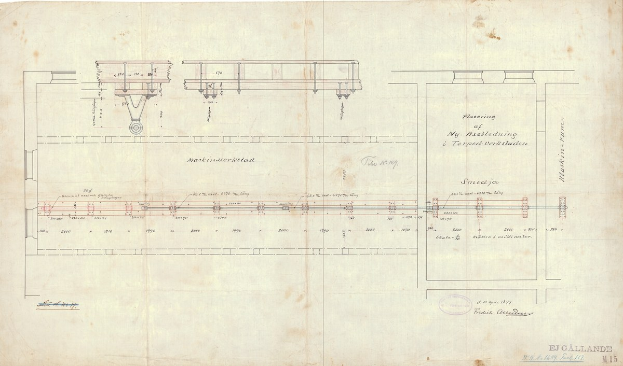 Ein detailliertes Zeichnung eines Eisenbahngeleises auf Papier, einschließlich Schienen, Lokomotiven und anderen Komponenten, mit begleitendem erklärendem Text.