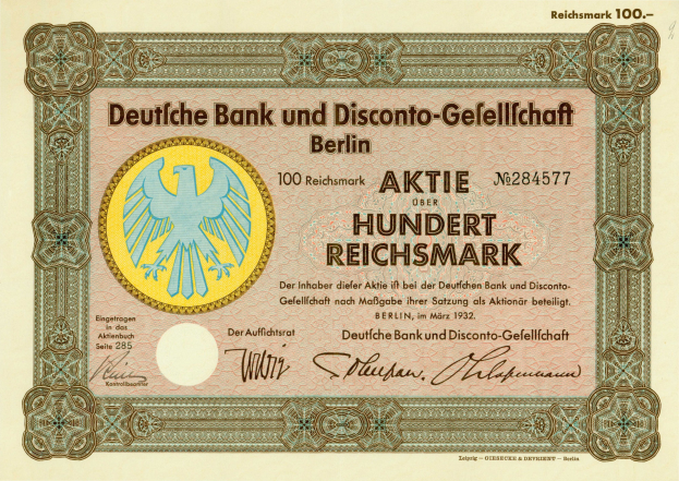 Alte deutsche Banknote mit einer Vogeldarstellung und dem Text "Deutsche Bank und Disconto-Gesellschaf Berlin" darauf.