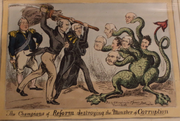 Eine Karikatur auf einem Blatt, das die Reformchampions beim Besiegen eines Monsters namens 'Korruption' zeigt, mit dem Text 'Die Reformchampions zerstören das Monster der Korruption.'